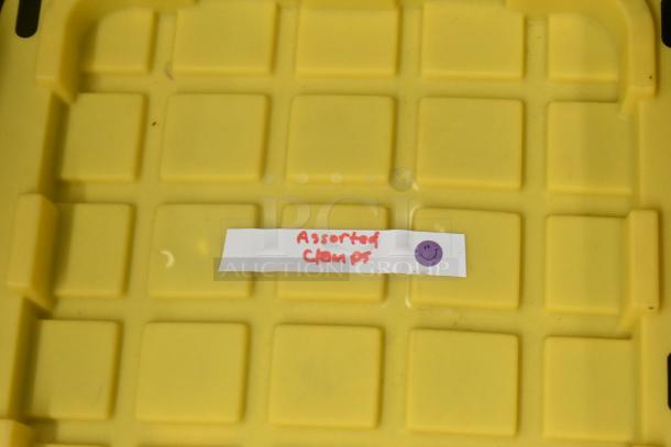 Stanley hard case lid with label reading "Assorted Clamps" and a purple smiley face sticker.