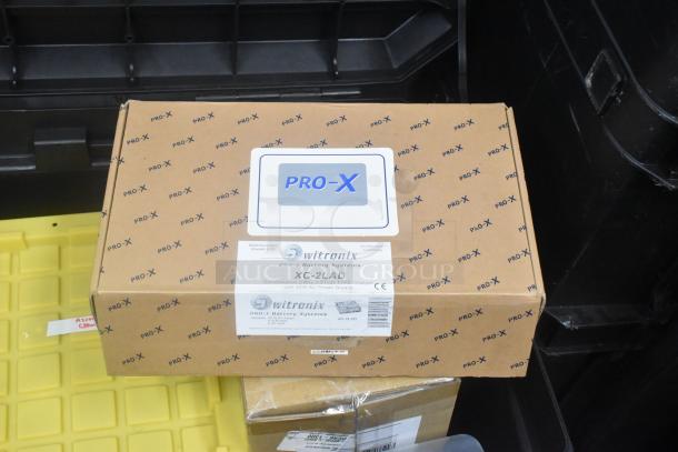 Stanley hard case containing mounting hardware, clamps, SM extension cords, air blowers, Ethernet cables, viewfinder; includes labeled Pro-X box.