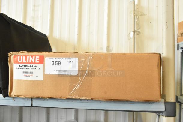 Brown box labeled "ULINE H-2475-DRAW" on a shelf; contains Rubbermaid FG459300 Center Drawer Accessory Kit.