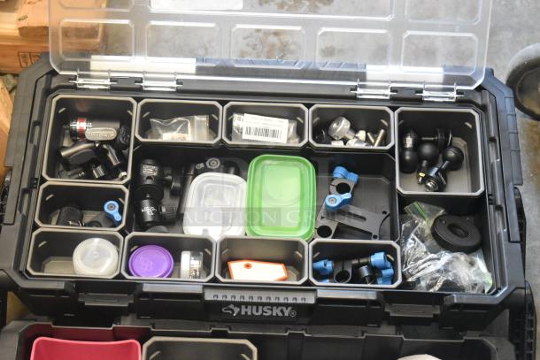 Husky poly bin with assorted hardware contents, includes screws, plastic lids, and connectors, in good condition.