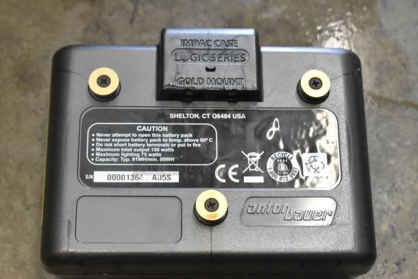 Ape Case with Anton Bauer HC Dionic, Dual Charger; Gold Mount, 91Wh capacity, 150W output. Markings indicate caution and specs.