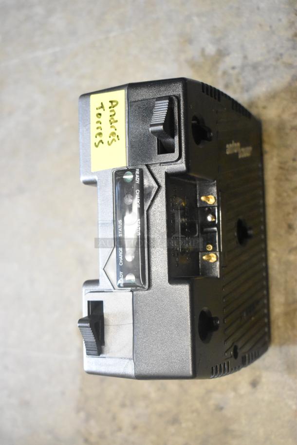 Ape Case with Anton Bauer HC Dionic battery and dual simultaneous charger; visible charge status indicators and labeling.