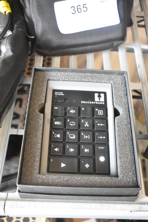 Dragon Frame Key Pad in original packaging, mint condition. Features multiple control buttons for animation software.