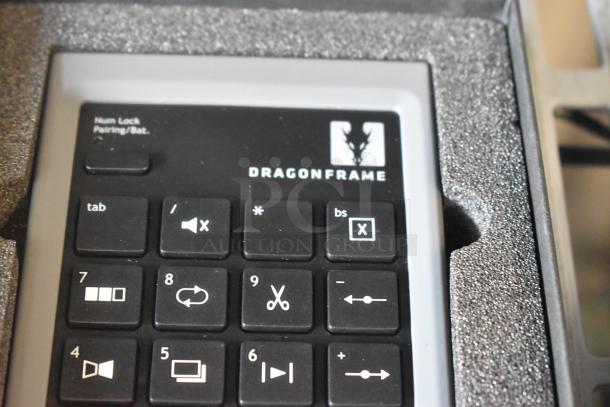 Dragon Frame Key Pad in foam packaging, featuring branded logo and specialized function keys, in excellent condition.