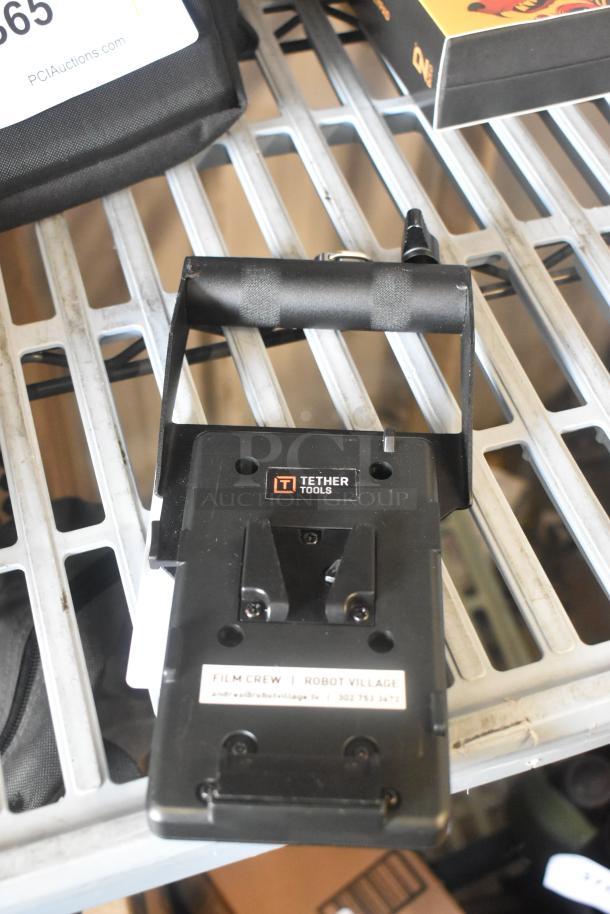 Tether Tools V Mount in good condition, features durable build, visible logo. Ideal for film and photography setups.