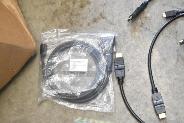 Lot of various cables in poly bin, including HDMI cables. Some in labeled bags. Ideal for electronics setups.
