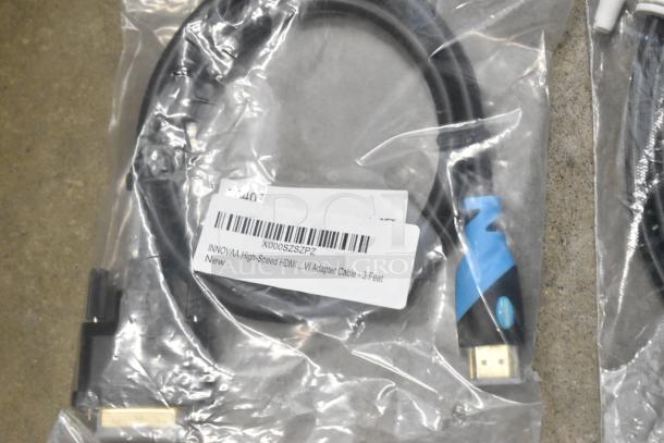 Lot of various items including new INNOVA high-speed HDMI adapter cable, 3 feet, in poly bin.