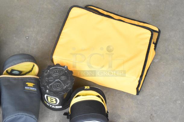 Lot with camera equipment, including a Mountainsmith camera case and Beta Shell lens case, in a yellow poly bin.
