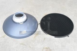 Lighting bonnet and plate, branded "Impact," feature a metallic build with a honeycomb grid. Good condition, slight wear.