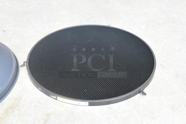 Black lighting bonnet plate with honeycomb design, excellent condition. Label shows "Impact" and "BGC-16" model.