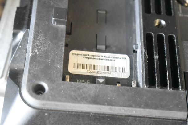 Small HD Monitor with label indicating assembly in North Carolina, USA; components made in China. Model 702OLED-0094.