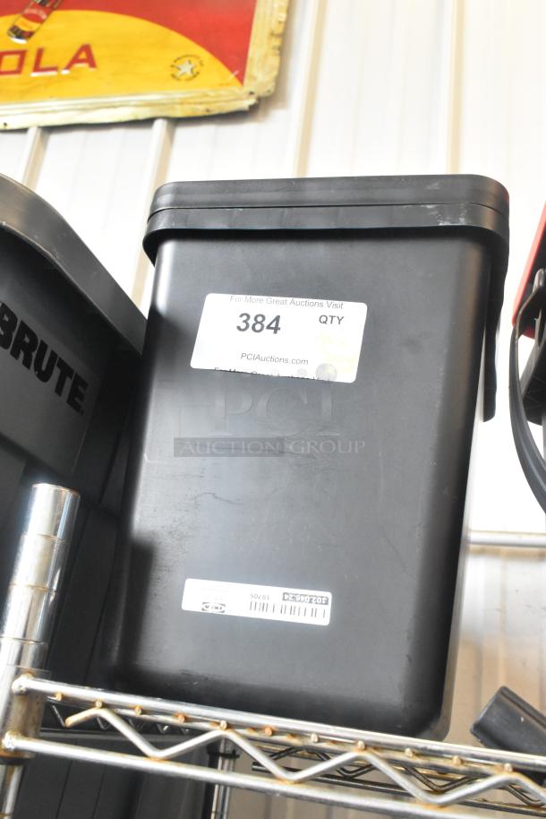 Poly bucket containing a lot of clamps, labeled "384" for auction purposes, in used condition.