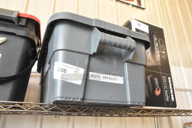 Gray Rubbermaid storage bin labeled "Movi Handles." Contains various items. Auction label reads "386 QTY x3 w/ tote."