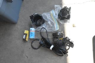 Lot of various items including a Lowel I-Light, connectors, and a halogen lamp in a poly bin; used condition.