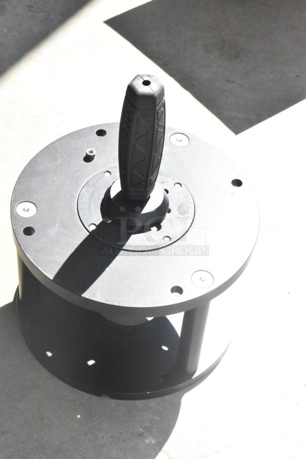 Kessler Riser with rubberized handle, cylindrical design, and visible screw holes, in good condition.