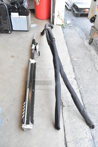 Duratruss DT-3900L 13-foot Smart Crank Stand, black, in good condition, shown folded with protective covers.