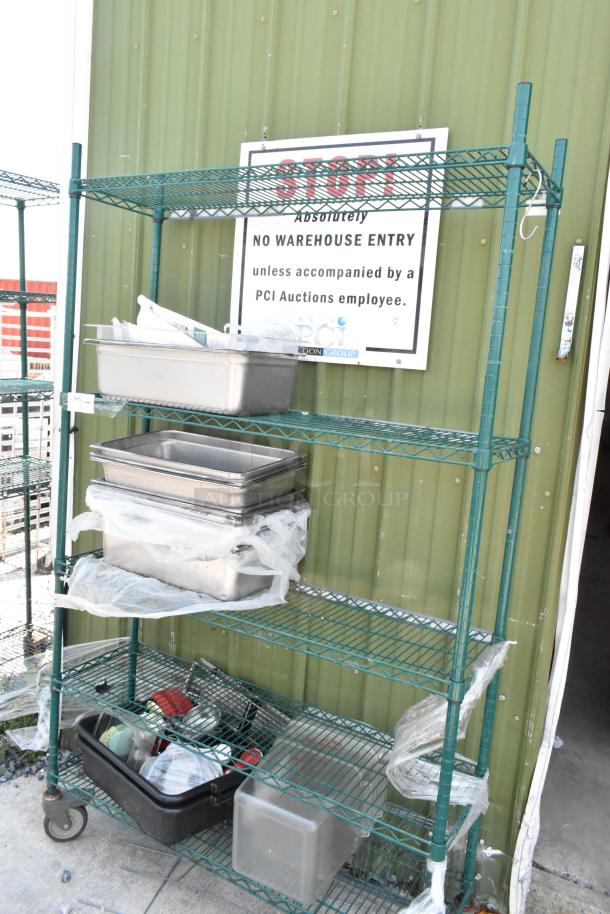Green Finish 5 Tier Wire Shelving Unit on Commercial Casters w/ Contents Including Stainless Steel Drop In Bins. BUYER MUST DISMANTLE. PCI CANNOT DISMANTLE FOR SHIPPING. PLEASE CONSIDER FREIGHT CHARGES. - Image 1 of 5