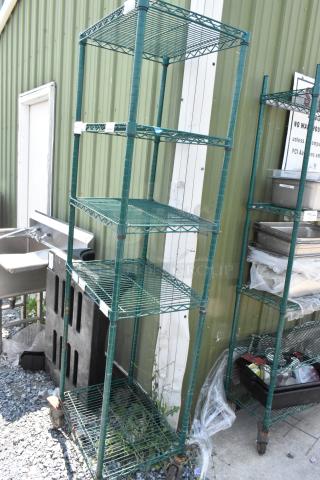 Green 5-tier wire shelving unit on casters, industrial design, sturdy metal construction, requires buyer dismantle.