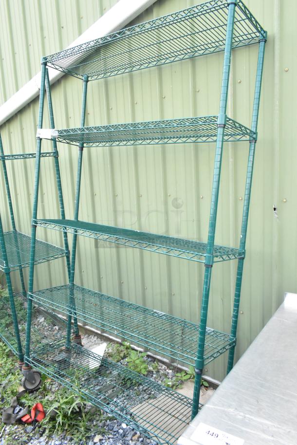 Green 5-tier wire shelving unit on commercial casters, used condition. Requires dismantling. Consider freight charges.