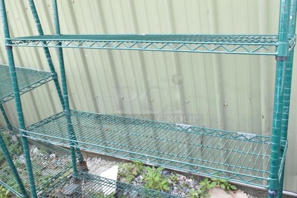 Green 5-tier wire shelving unit on commercial casters, sturdy design, requires dismantling for transport, freight considered.