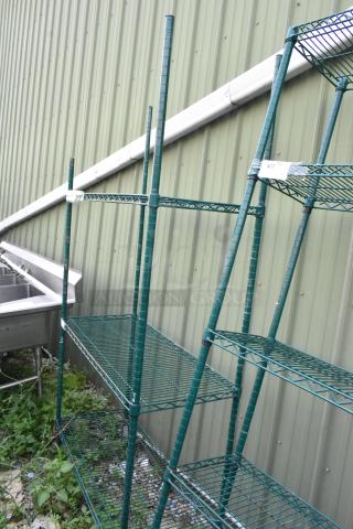 Green 3-tier wire shelving unit on commercial casters, metal construction, tag showing dimensions. Buyer must dismantle.