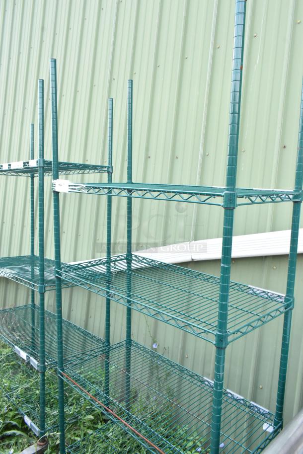 Green 4-tier wire shelving unit with commercial casters. Good condition. Buyer must dismantle for shipping.