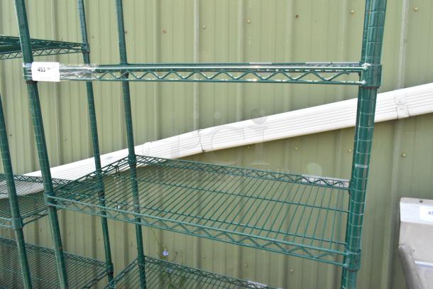 Green 4-tier wire shelving unit on commercial casters, in good condition. Buyer must dismantle. Consider freight charges.