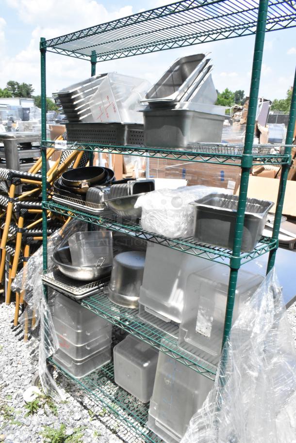 Green finish 4-tier wire shelving unit on commercial casters with stainless steel drop-in bins and poly bins.