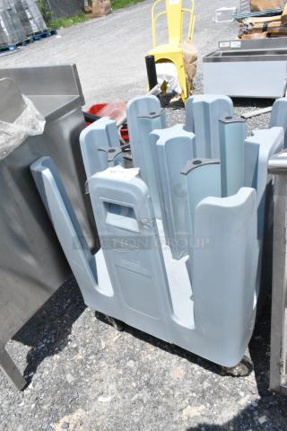 Metro PCD Poly Dish Cart on commercial casters, light gray, durable plastic, for holding and transporting dishes, in used condition.