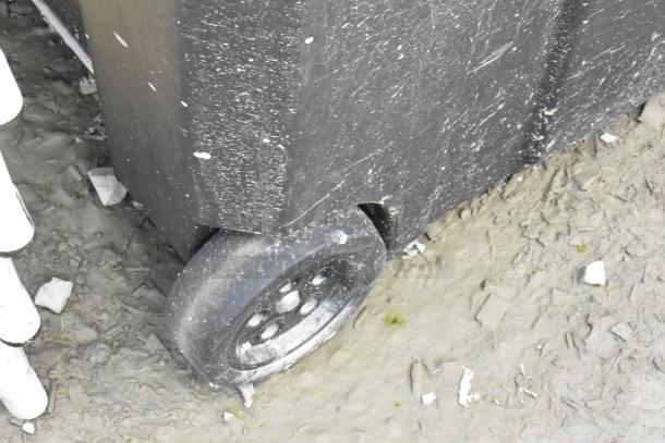 Stanley black poly case on casters, showing signs of wear with scuffs on the surface.