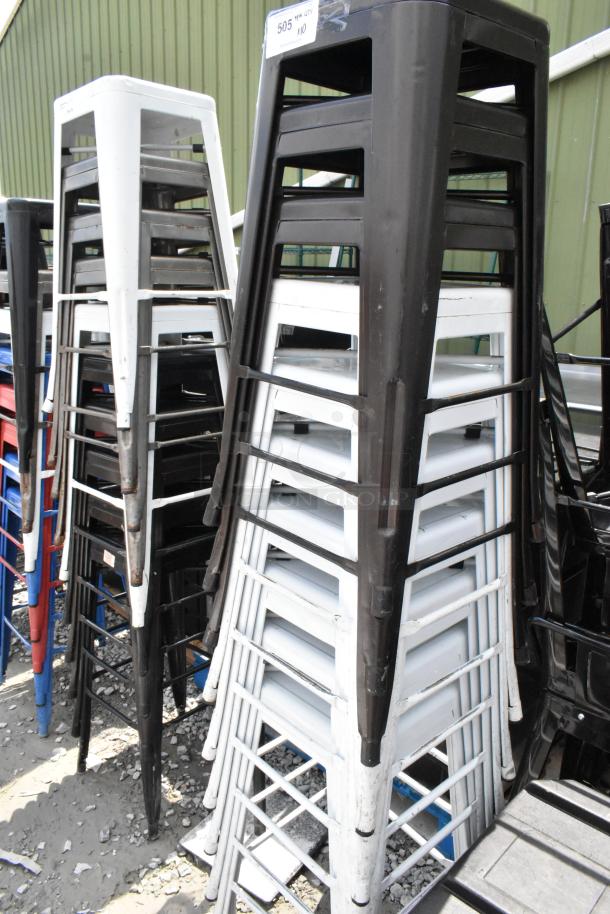 10 Tolix style metal bar height stools in assorted colors; stackable design, industrial look, good condition.