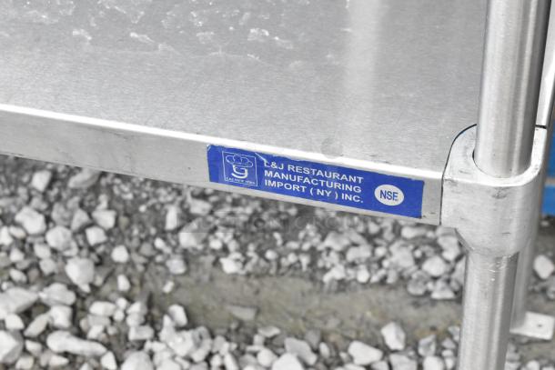 Stainless steel 2-tier over shelf with L&J Restaurant Manufacturing label; sturdy, NSF certified.