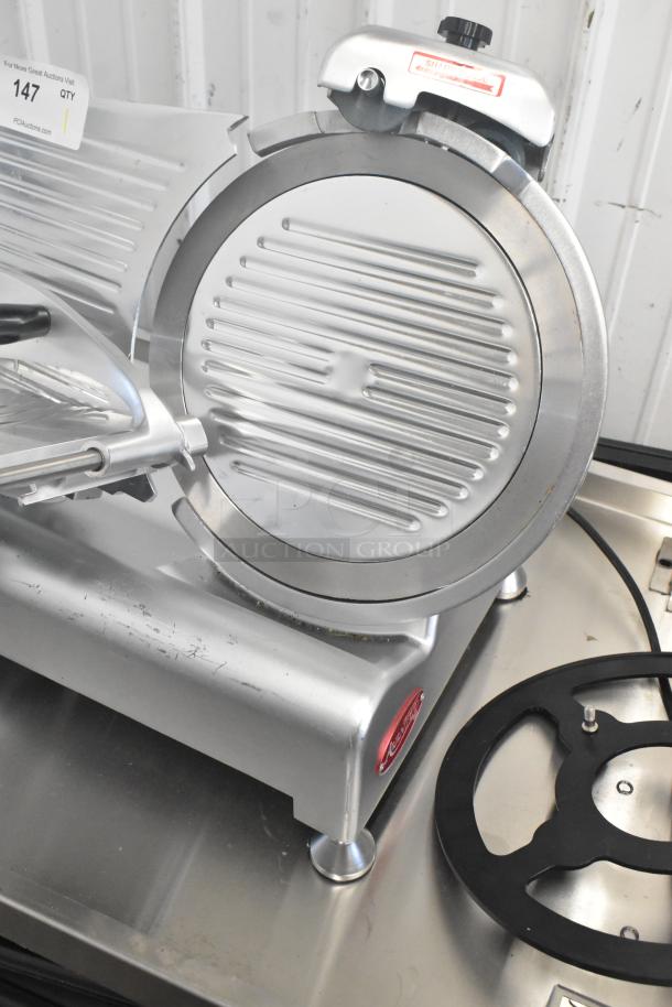 Avantco 177SL312 metal countertop meat slicer with integrated blade sharpener. Features stainless steel finish and 115V power.
