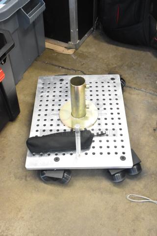 Lot of various items including a Movi Elevator on a perforated metal base in a poly bin, good condition.
