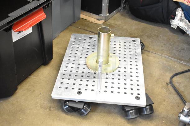 Lot of various items including a Movi elevator on a perforated metal base with wheels, stored in a poly bin, good condition.