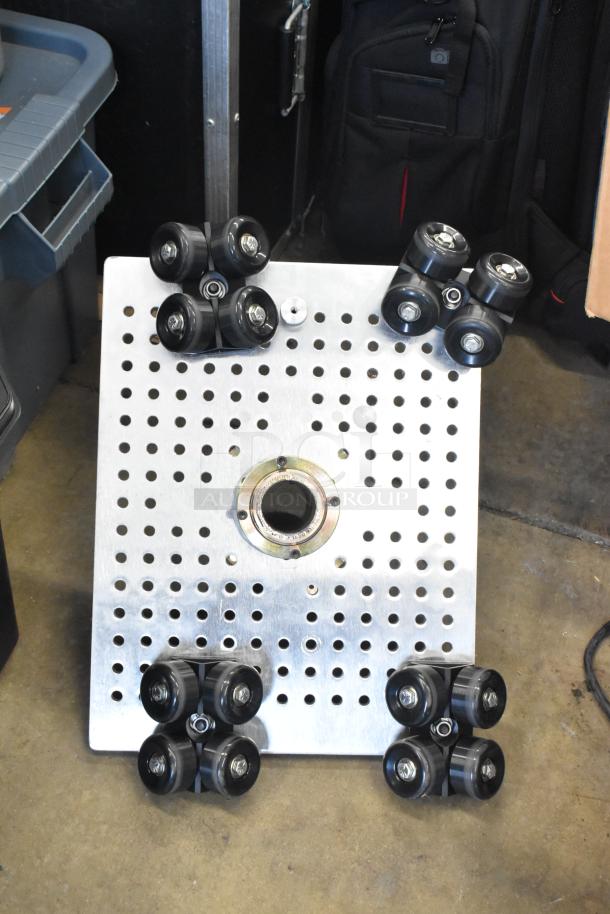 Various items including Movi Elevator in poly bin, featuring perforated metal platform and multiple caster wheels. Good condition.