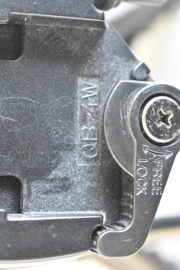 Velbo Mini Stand close-up showing locking mechanism and "QB-4W" marking; sturdy, reliable condition.