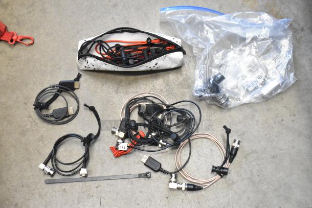 Three bags containing assorted cables, connectors, and electronic accessories. Includes HDMI and USB. Various conditions.