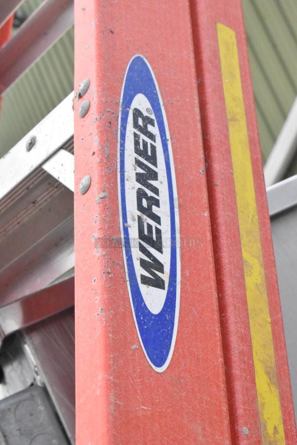 Werner 10' A-frame ladder, red, with visible logo, used condition, showing minor scuffs and wear.