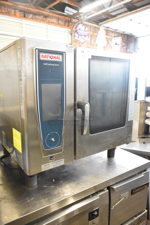 2018 Rational SCC WE 61G stainless steel countertop gas combi convection oven, touchscreen, minor wear.