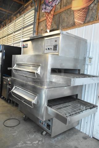 Middleby Marshall PS360 stainless steel conveyor pizza oven, natural gas, 135,000 BTU, on commercial casters.