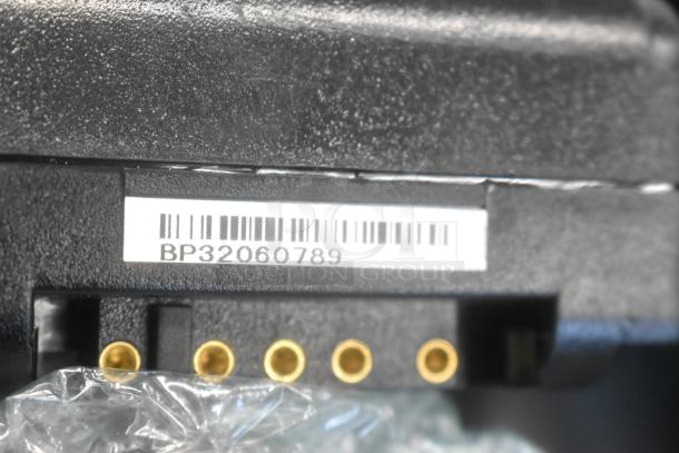 Hard black case with Canon DS126371 camera body, Canon Battery Grip BG-E8, wires; barcode BP32060789 visible.