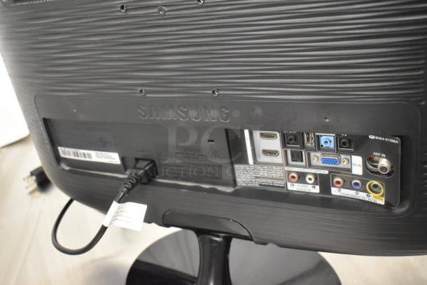 Samsung LS22PINSF/ZA TV, in original box, tested and working. HDMI, VGA, and audio ports visible.