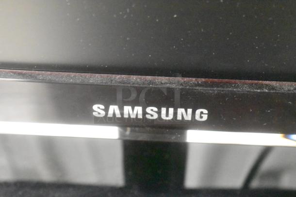 Samsung P2450 Monitor in original box, tested and working. Black frame with visible Samsung logo.