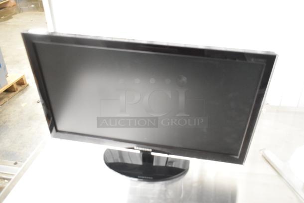 Samsung P2450 Monitor in original box. Tested, working condition. Black frame, includes base stand. Ideal for home use.