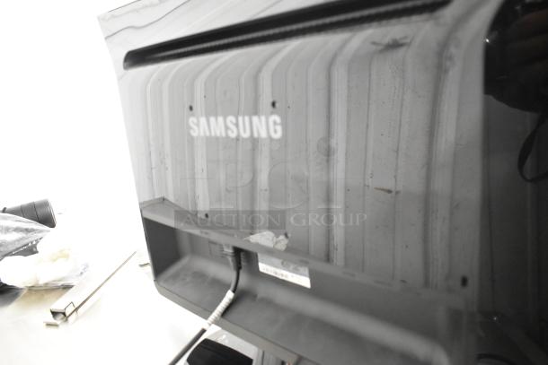 Samsung P2450 monitor in original box, tested and working. Rear view shows Samsung logo and cable ports. Excellent condition.
