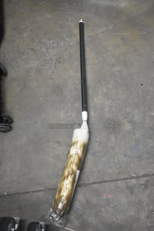 Brand new telescopic wool duster with black handle, beige wool head in plastic wrap, ideal for dusting high places.