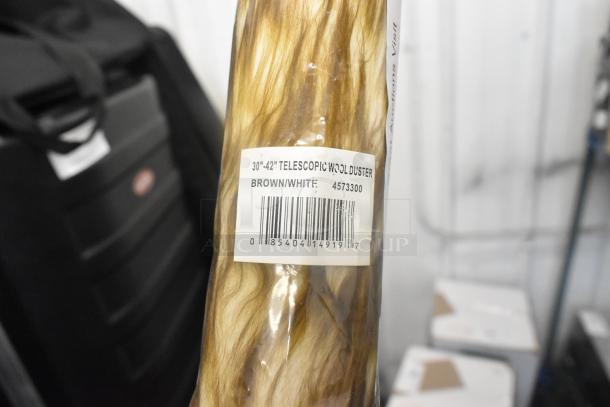 Brand new brown/white telescopic wool duster, adjustable 30"-42". Item code 4573300, sealed packaging.