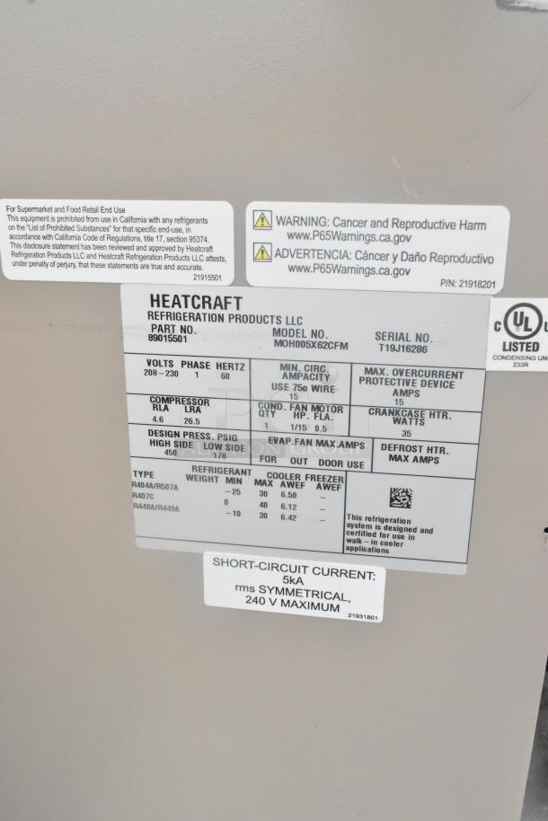 8'x10' Thermalrite Walk In Freezer with Heatcraft evaporator and condenser. Condition not verified. Labels on panel visible.