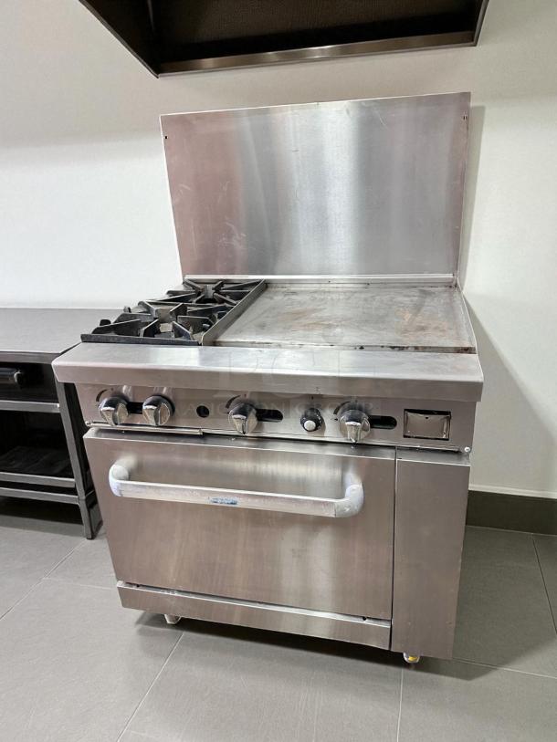 Southbend X4601DD 36" gas range with 2 burners, 24" griddle, excellent condition, natural gas, fully tested and working.